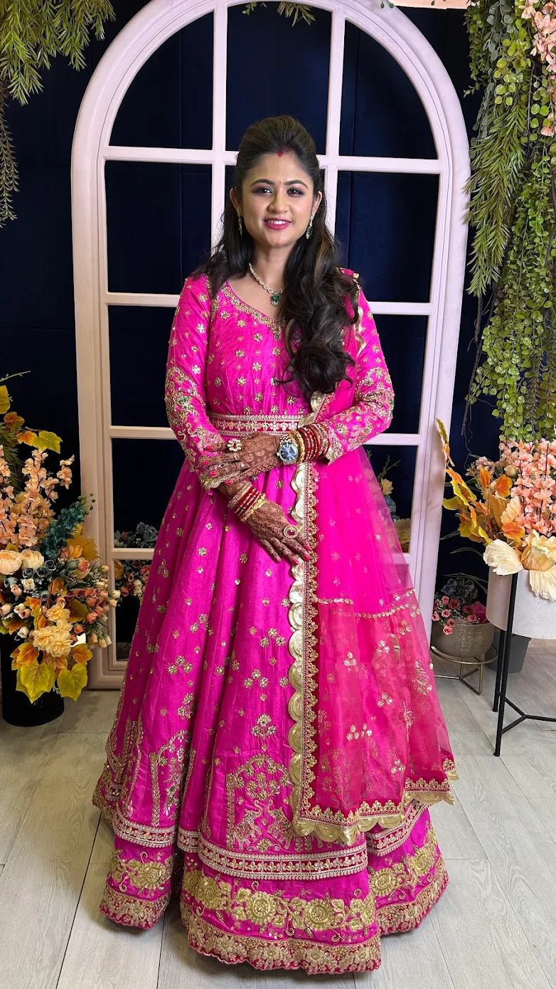 Client wearing custom embroidered outfit